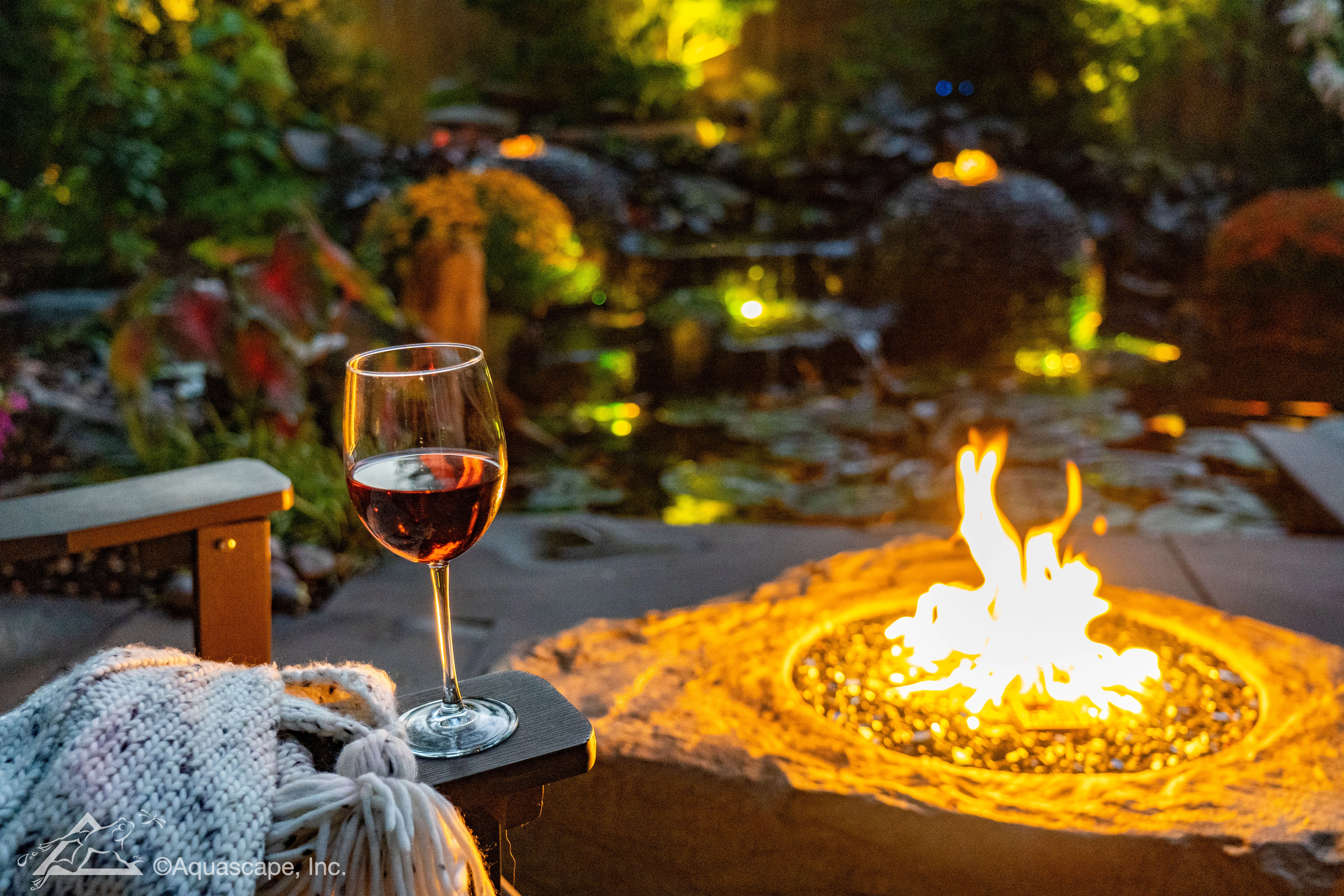 Outdoor living space with a water feature