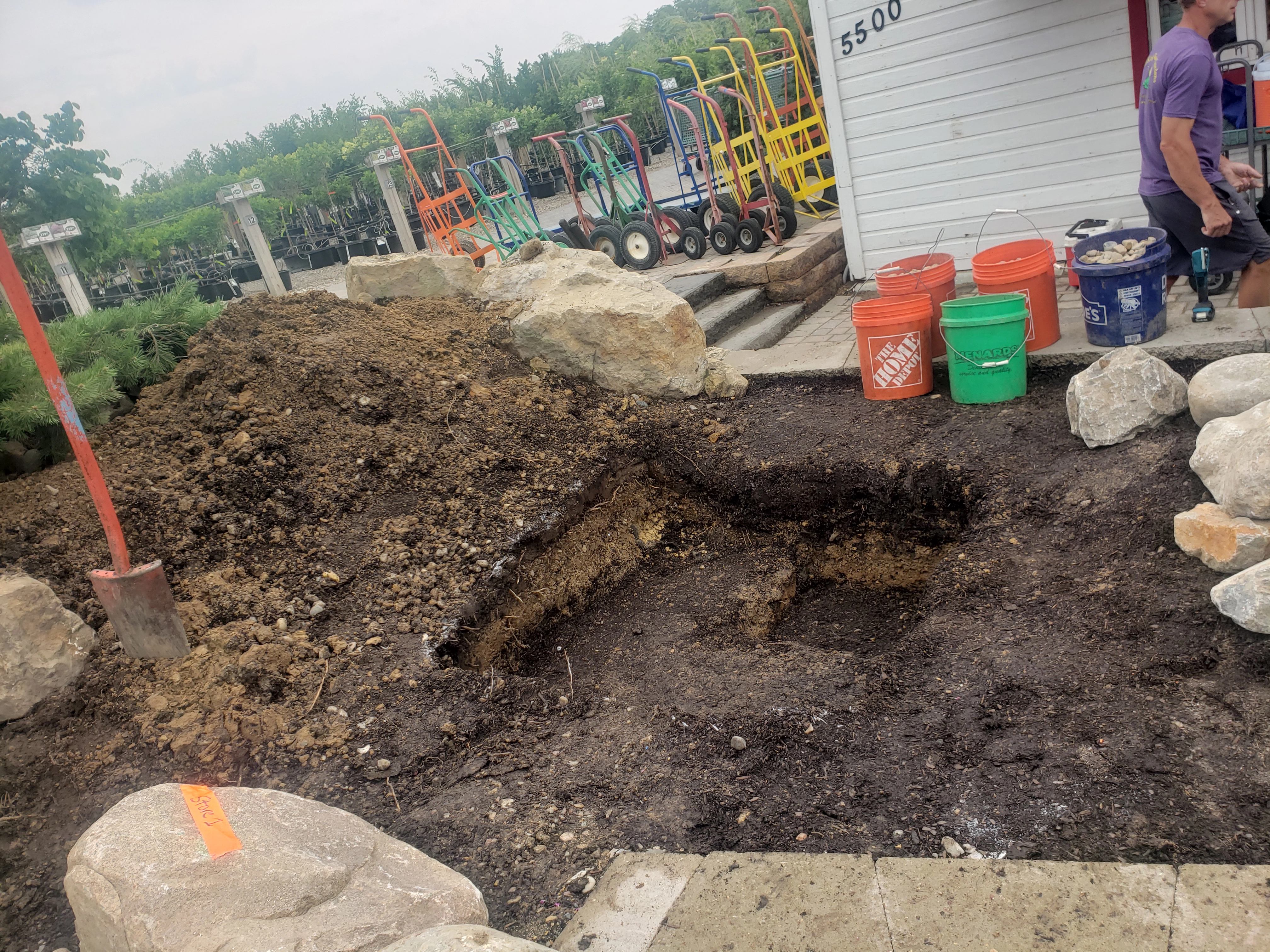 Beginning stage of pondless waterfall installation layout and excavation