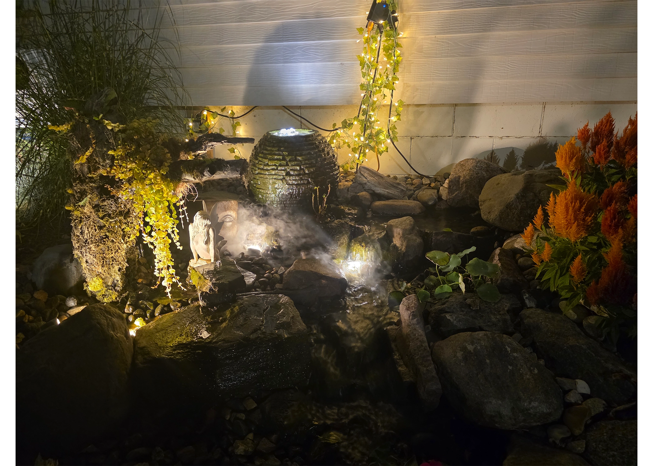 Natural pondless waterfall stream designed for a New Ulm Minnesota property