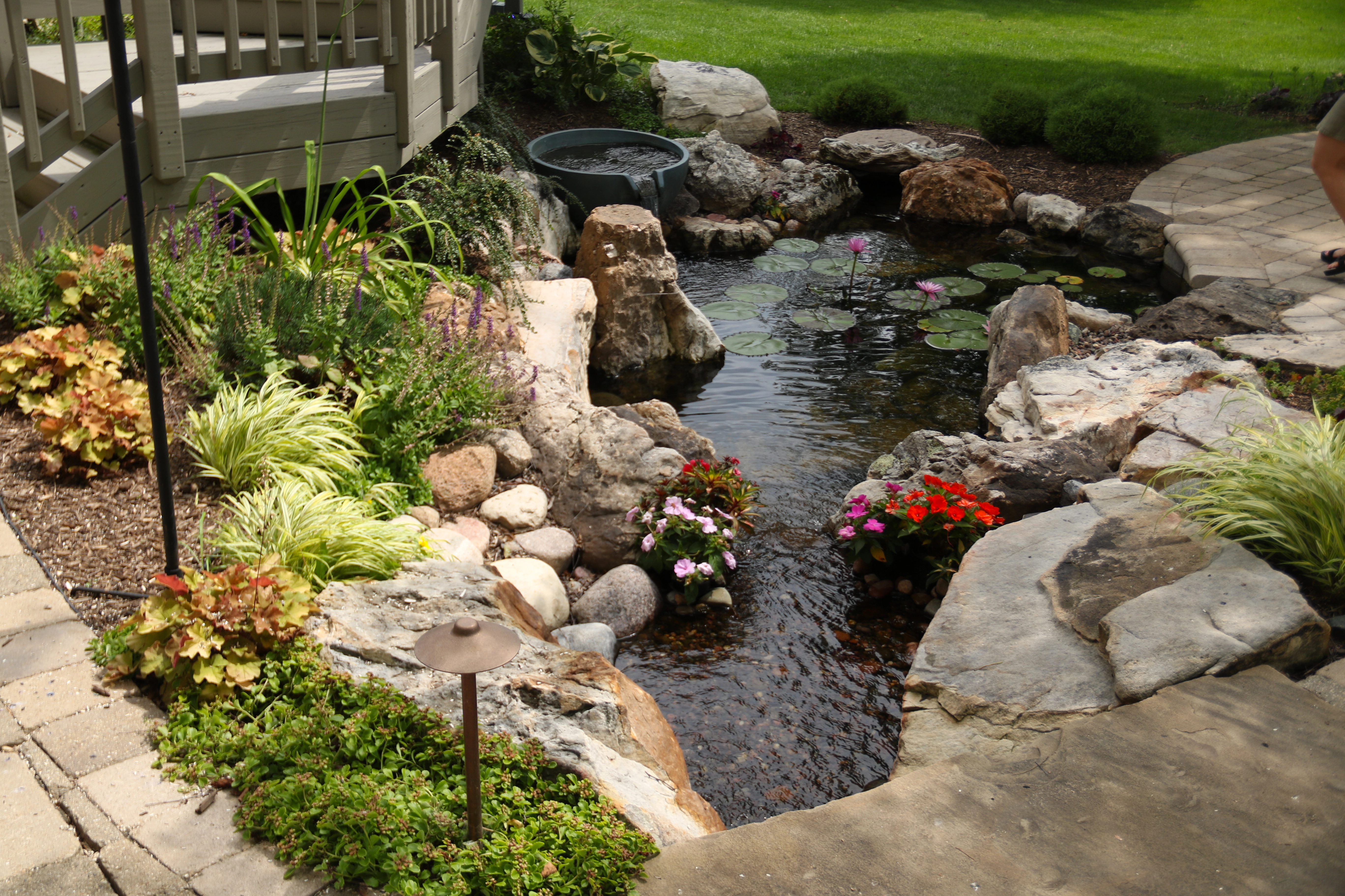 Small pond between patios in Shoreview Minnesota