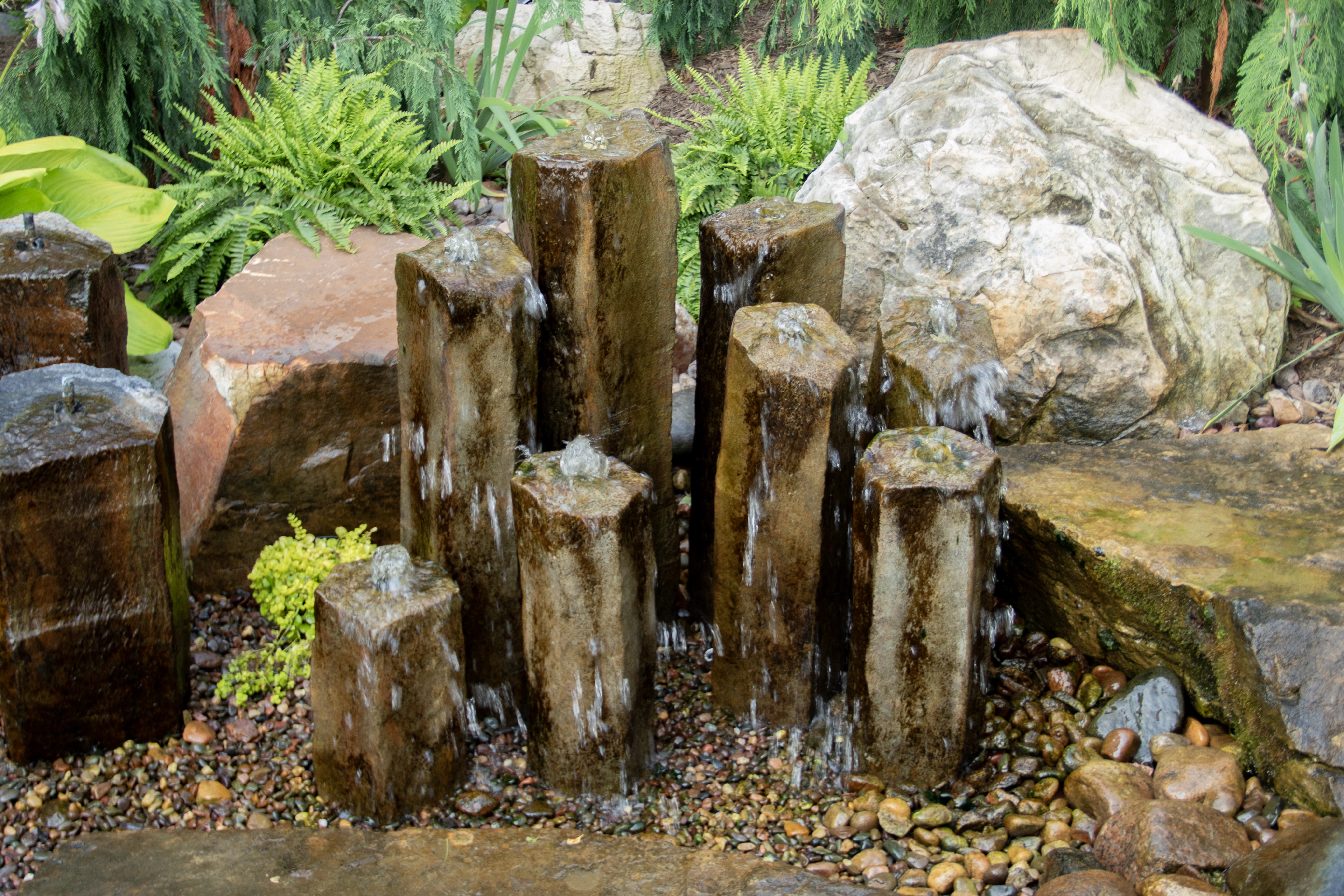 Basalt column fountainscape water feature in a Southern Minnesota landscape