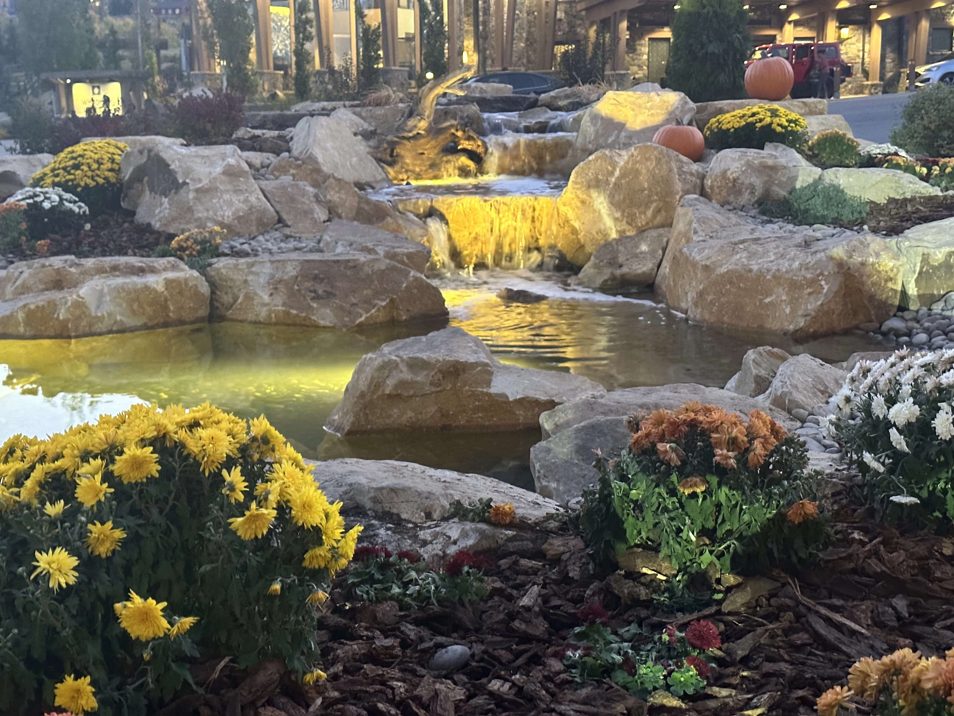 Ecosystem waterfall lighting at night in White Bear Lake Minnesota